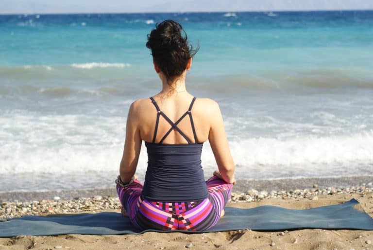 woman meditating to kill dead time