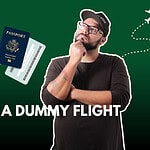 man looking at flight ticket
